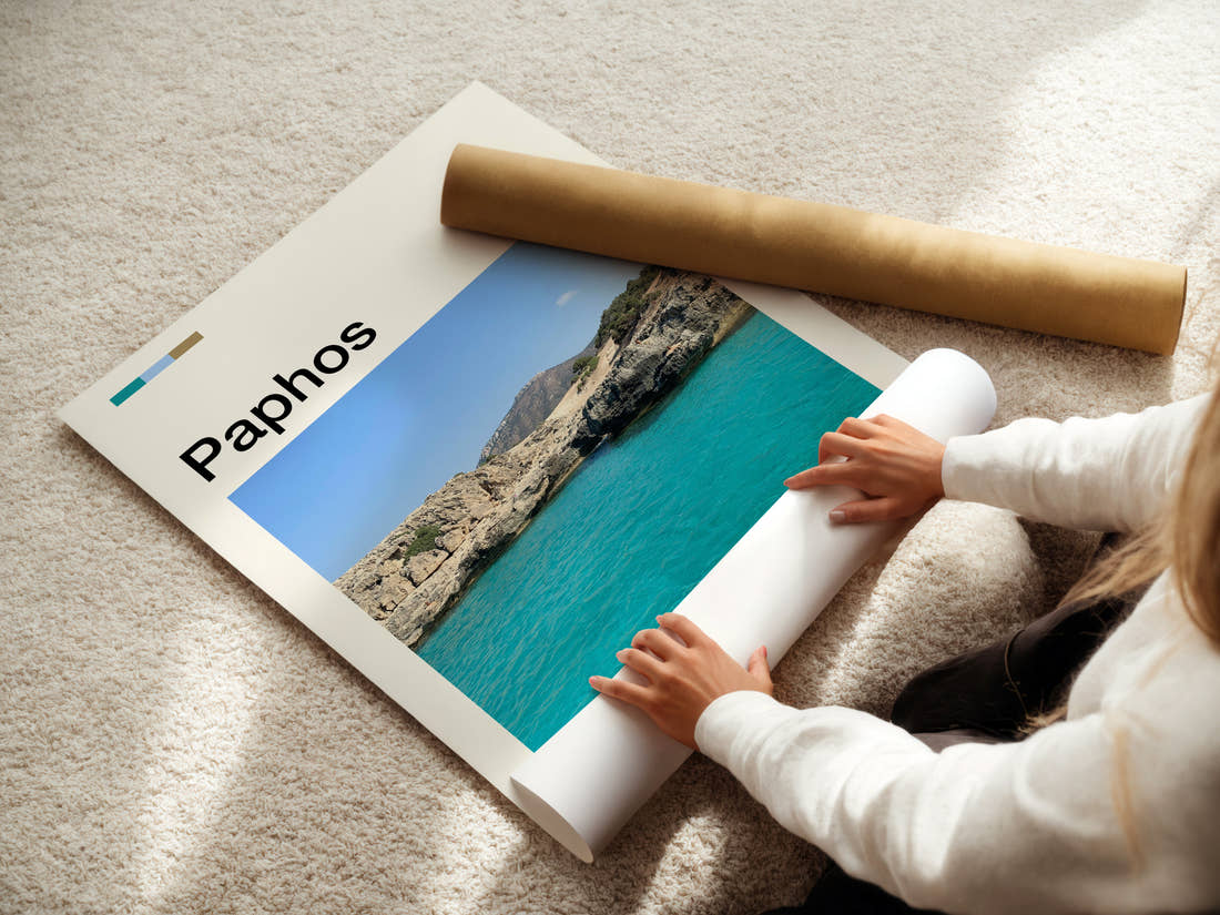 Paphos Turquoise Rocky Cove Travel Print being unrolled from its postal tube