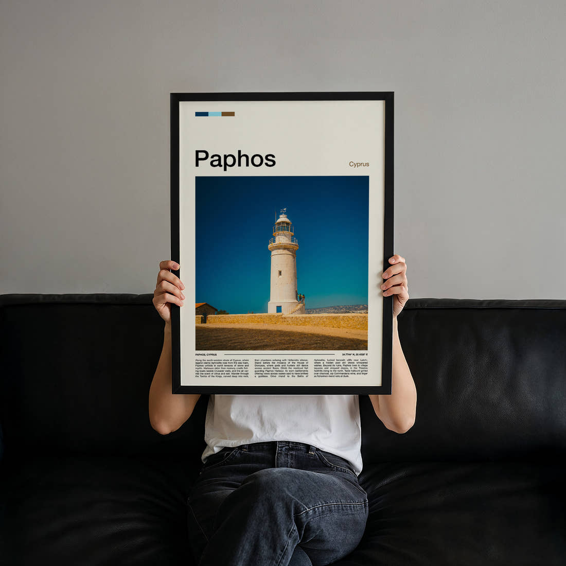 Paphos Coastal Lighthouse Tower Travel Print held up by hand to show the size of the print