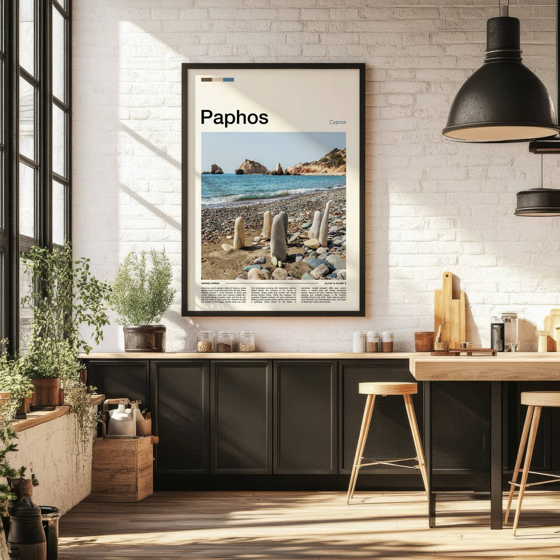 Paphos Pebble Beach Sculptures Travel Print framed on the wall of a bright kitchen and dining space