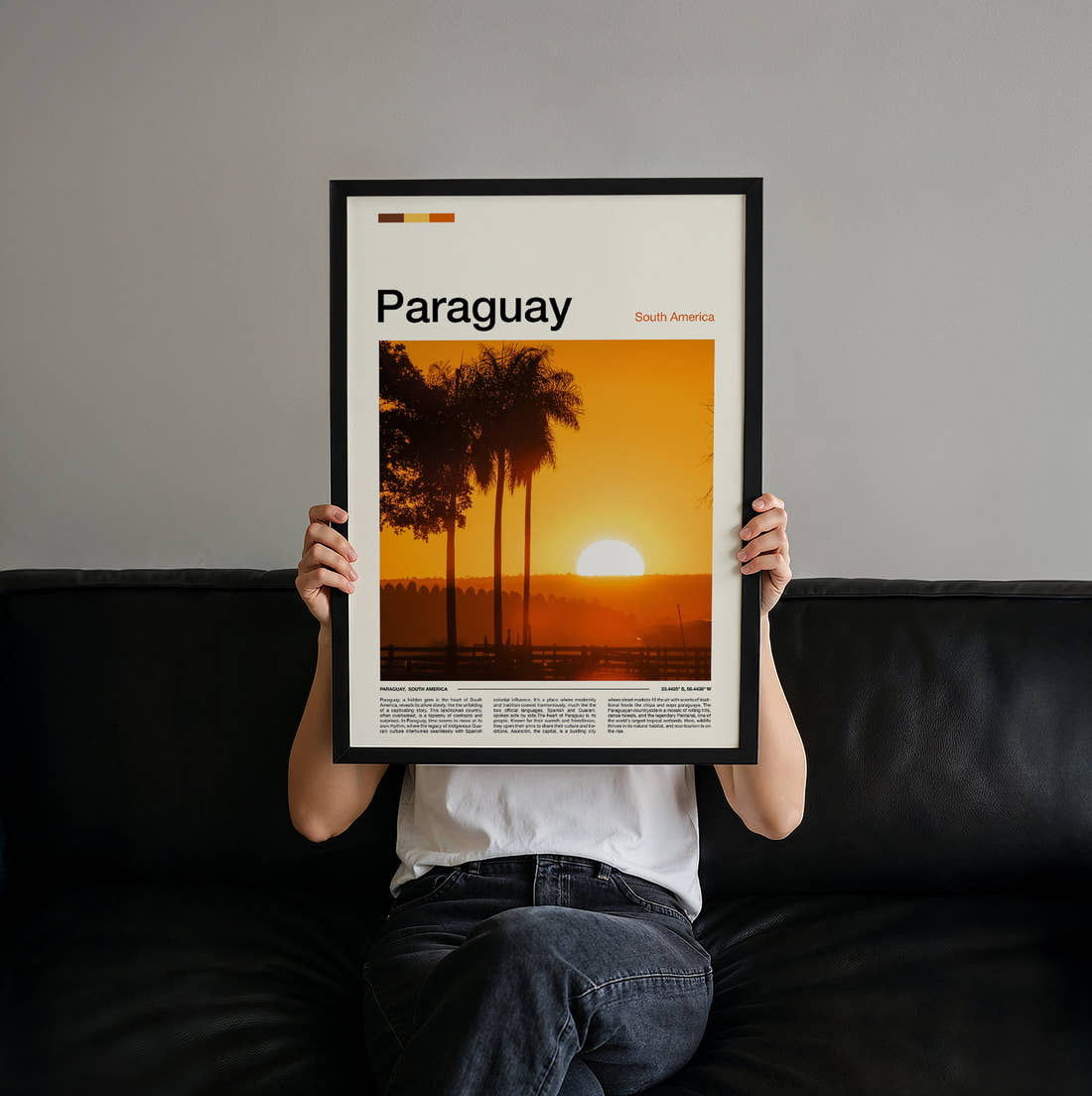 Paraguay Sunset Through Palm Trees Travel Print held up by hand to show the size of the print