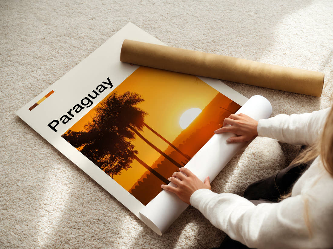 Paraguay Sunset Through Palm Trees Travel Print being unrolled from its postal tube