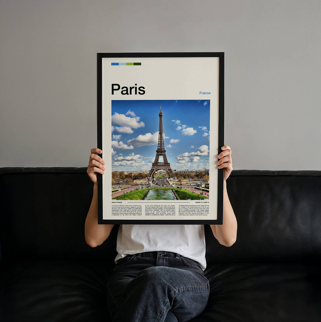 Paris Eiffel Tower Under Blue Skies Travel Print held up by hand to show the size of the print