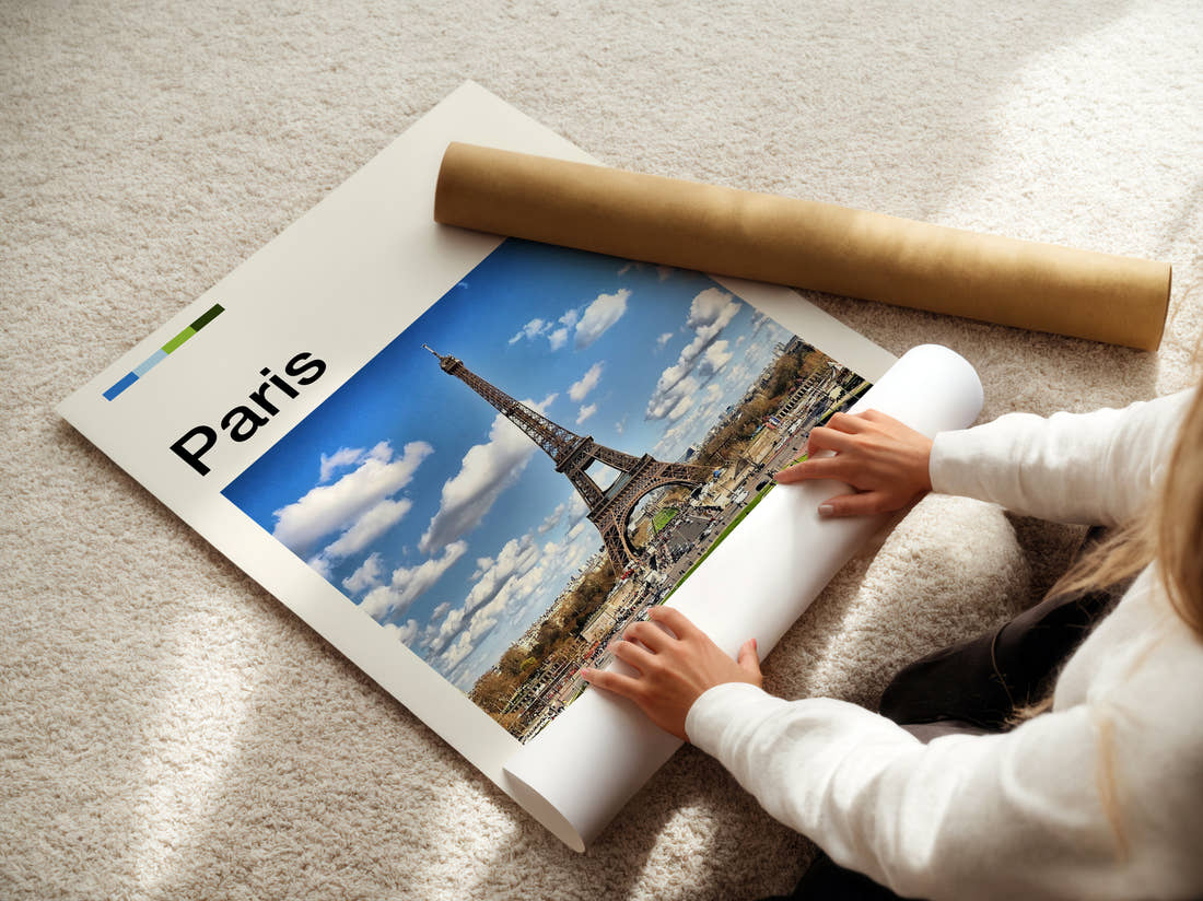 Paris Eiffel Tower Under Blue Skies Travel Print being unrolled from its postal tube