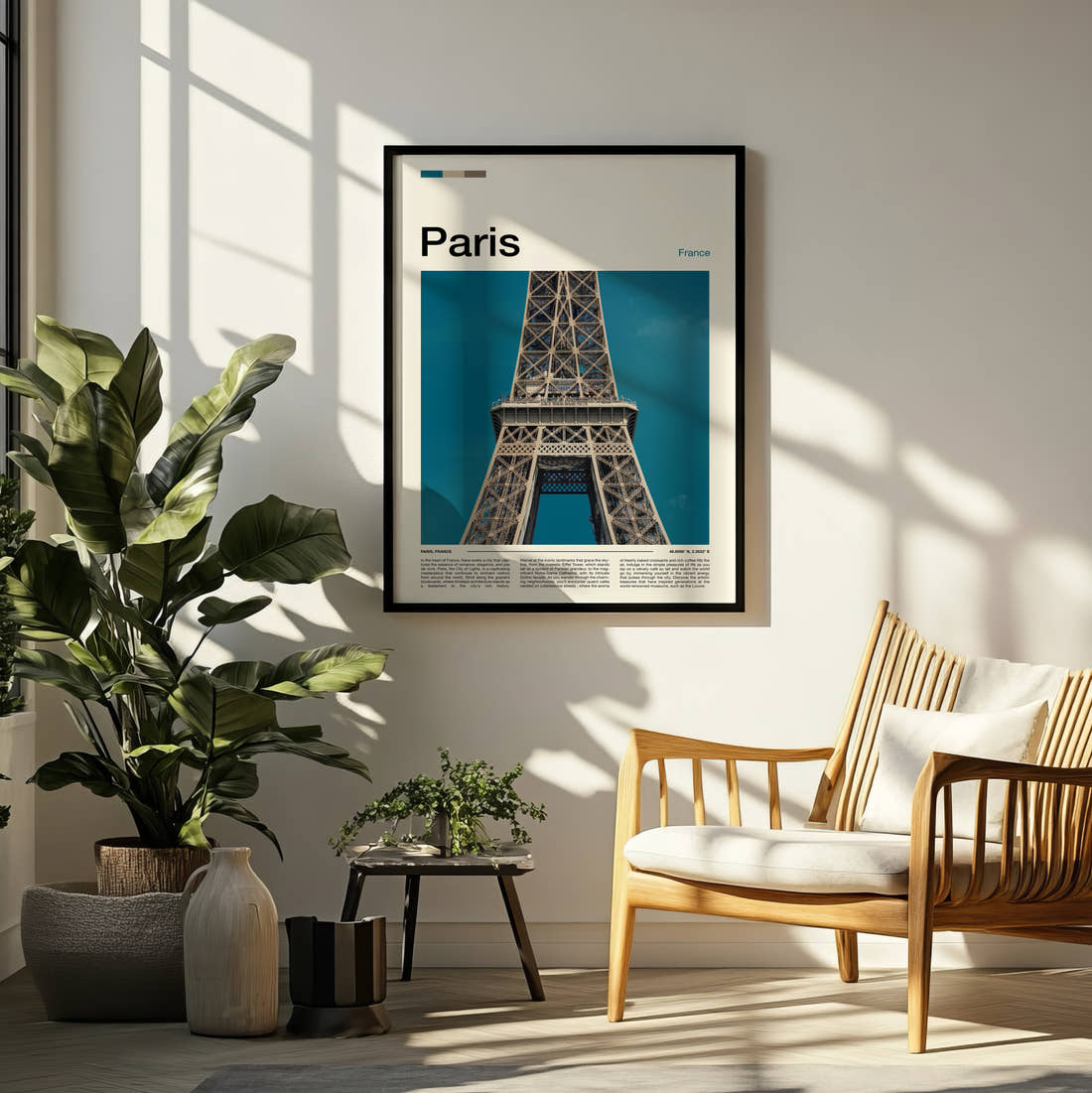 Paris Eiffel Tower Close-Up Travel Print framed on a pale wall beside houseplants