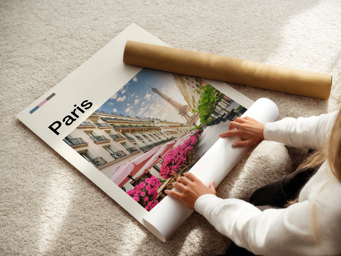 Paris Eiffel Tower And Blossom Travel Print being unrolled from its postal tube