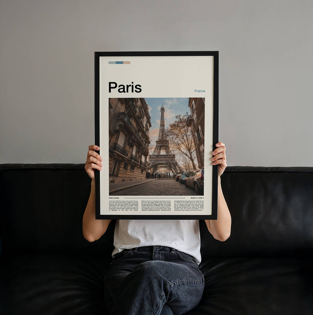 Paris Eiffel Tower From The Street Travel Print held up by hand to show the size of the print