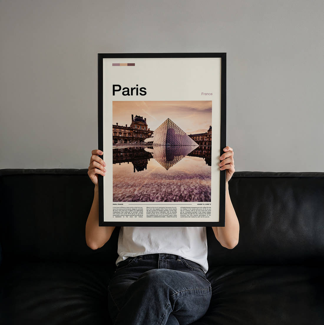 Paris Louvre Pyramid Reflection Travel Print held up by hand to show the size of the print