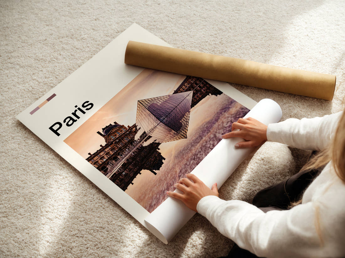 Paris Louvre Pyramid Reflection Travel Print being unrolled from its postal tube