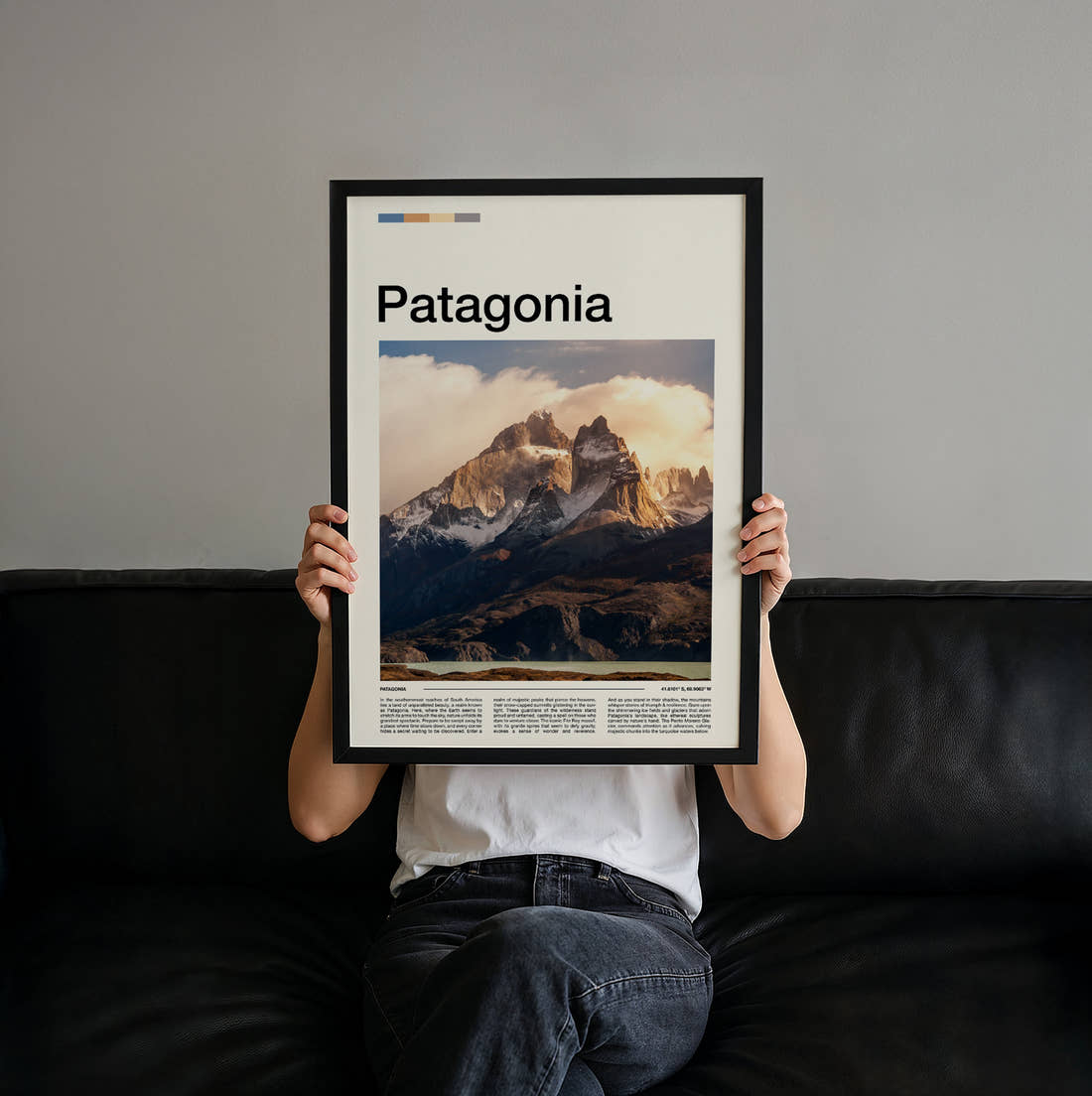 Patagonia Snowy Mountain Peaks Travel Print held up by hand to show the size of the print