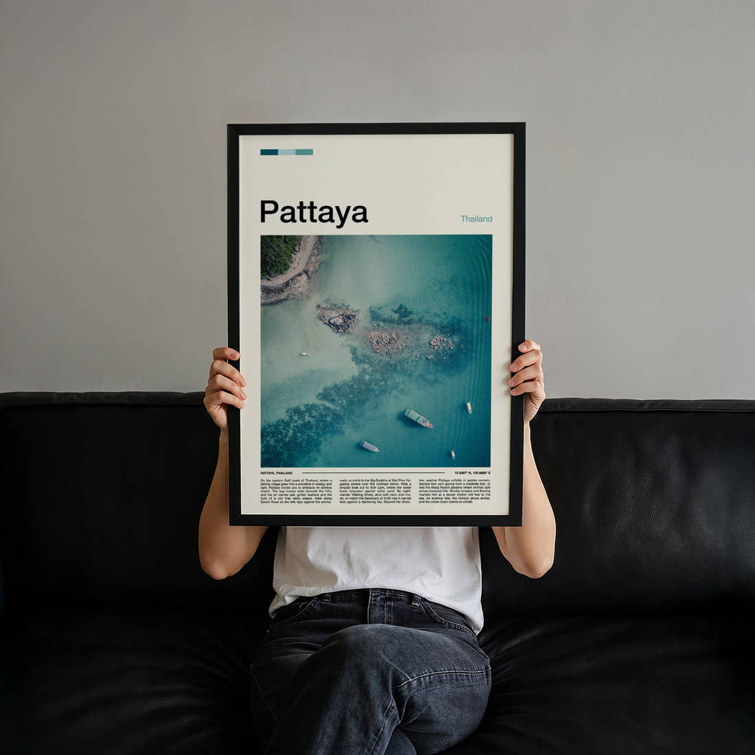 Pattaya Aerial Turquoise Coastline Travel Print held up by hand to show the size of the print