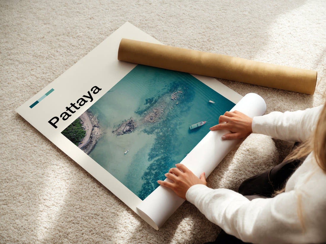 Pattaya Aerial Turquoise Coastline Travel Print being unrolled from its postal tube