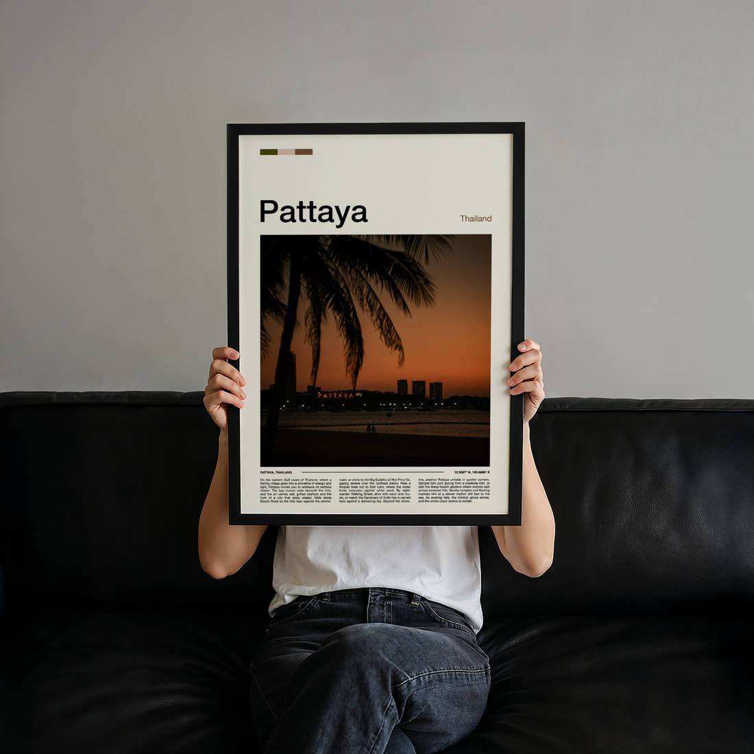 Pattaya Palm-Framed Sunset Skyline Travel Print held up by hand to show the size of the print