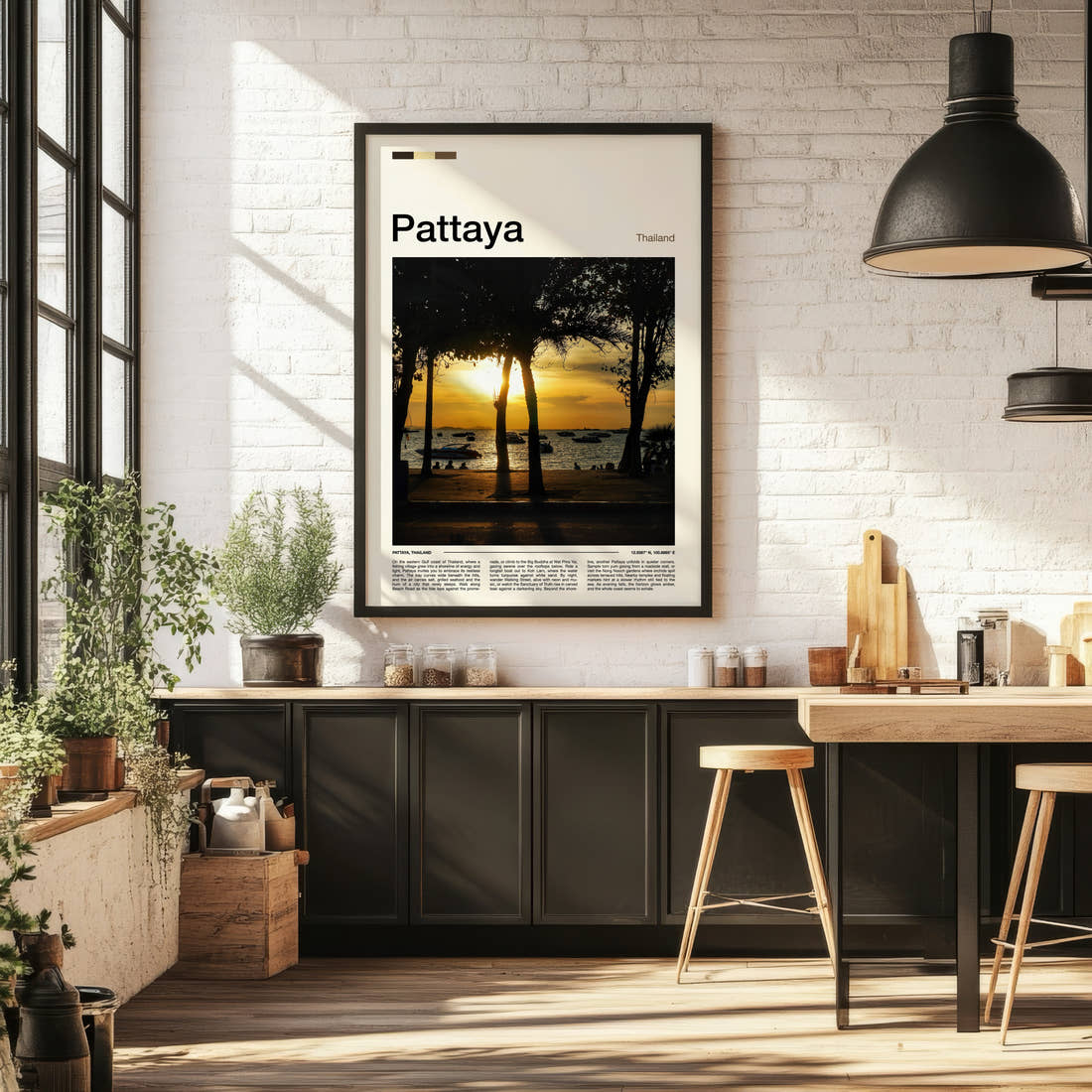 Pattaya Palm-Framed Sunset Travel Print framed on the wall of a bright kitchen and dining space
