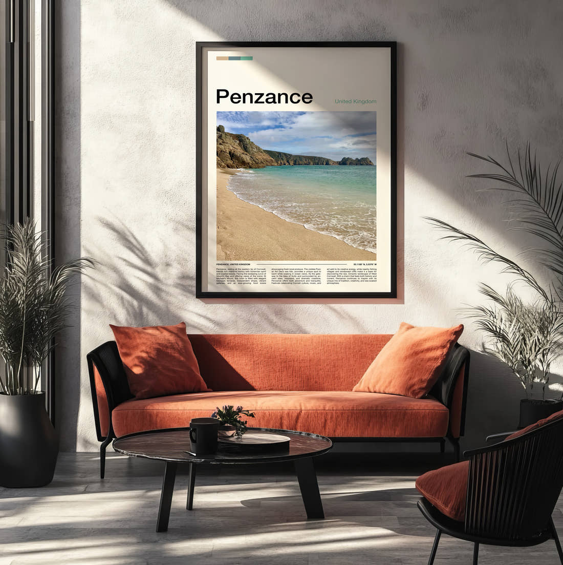 Penzance Beach And Cliffs Travel Print framed on the wall of a modern living room