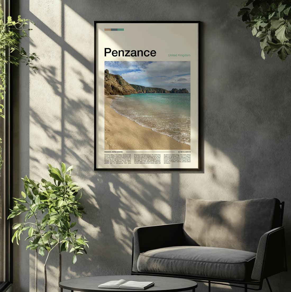 Penzance Beach And Cliffs Travel Print framed on the wall of a relaxed living room