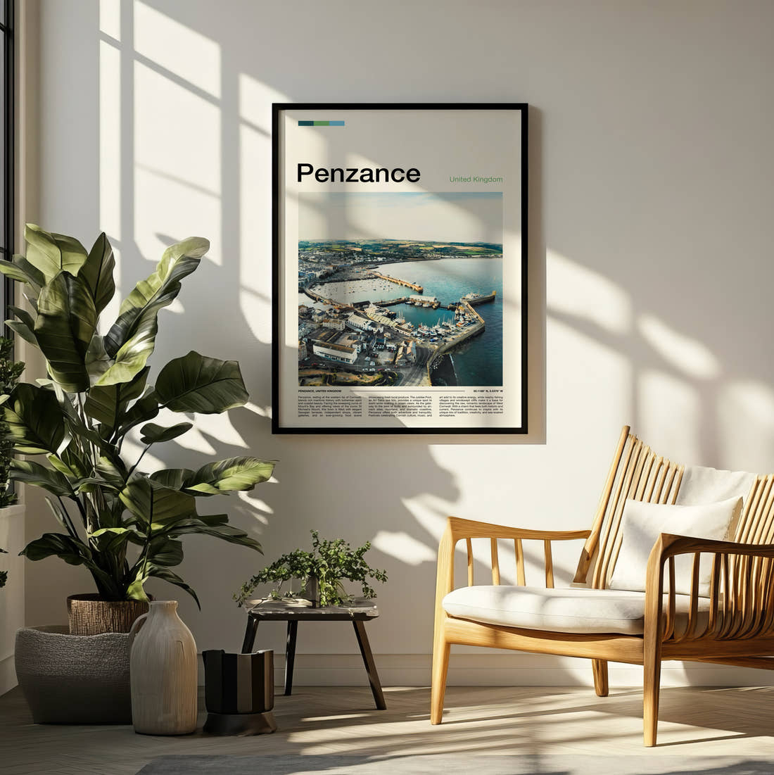 Penzance Harbour From Above Travel Print framed on a pale wall beside houseplants