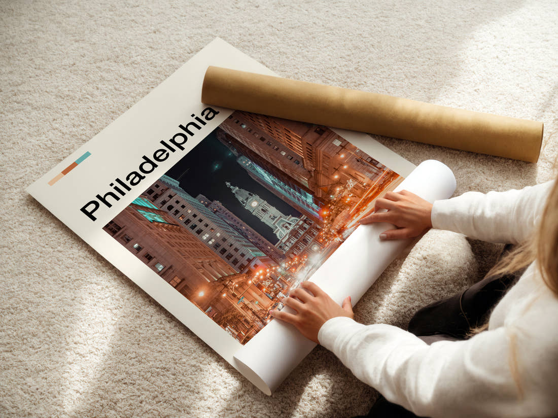 Philadelphia City Hall At Night Travel Print being unrolled from its postal tube