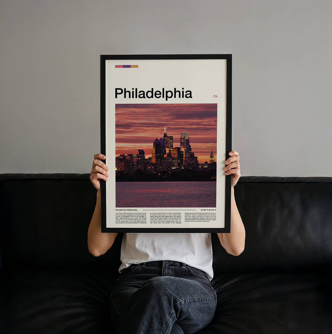 Philadelphia Skyline At Dusk Travel Print held up by hand to show the size of the print