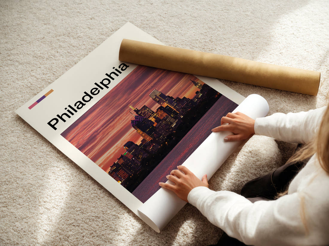 Philadelphia Skyline At Dusk Travel Print being unrolled from its postal tube