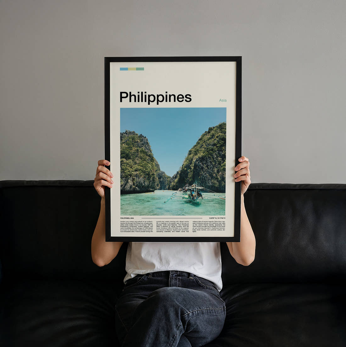 Philippines Outrigger Boat And Cliffs Travel Print held up by hand to show the size of the print