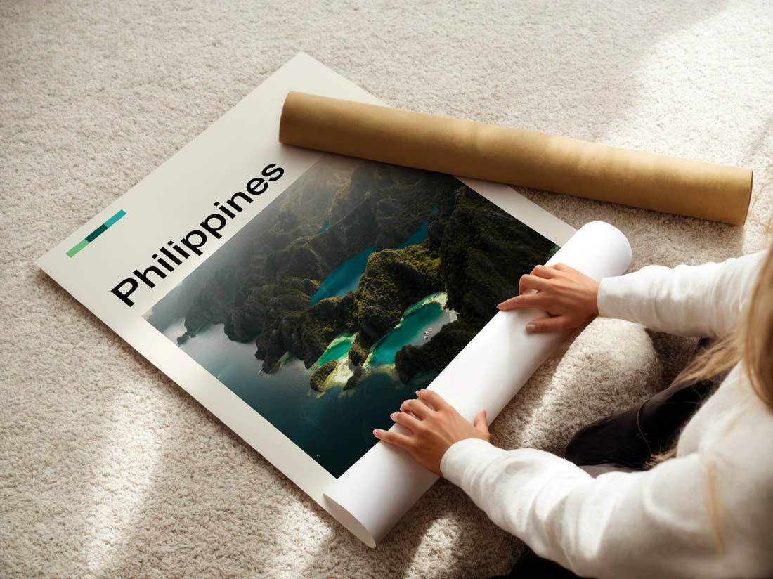 Philippines Aerial View Of Lagoons Travel Print being unrolled from its postal tube