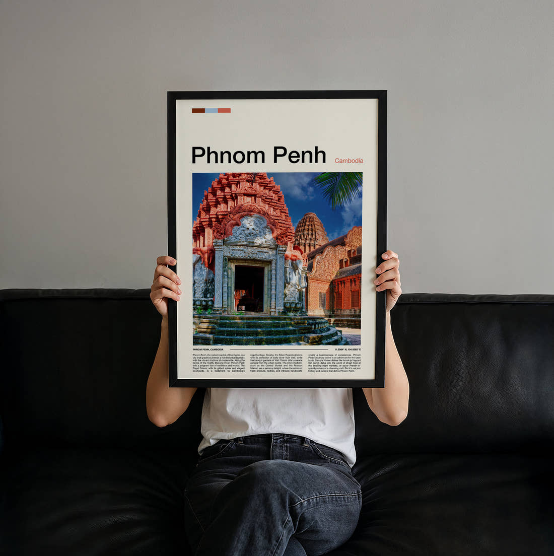 Phnom Penh Colourful Temple Travel Print held up by hand to show the size of the print