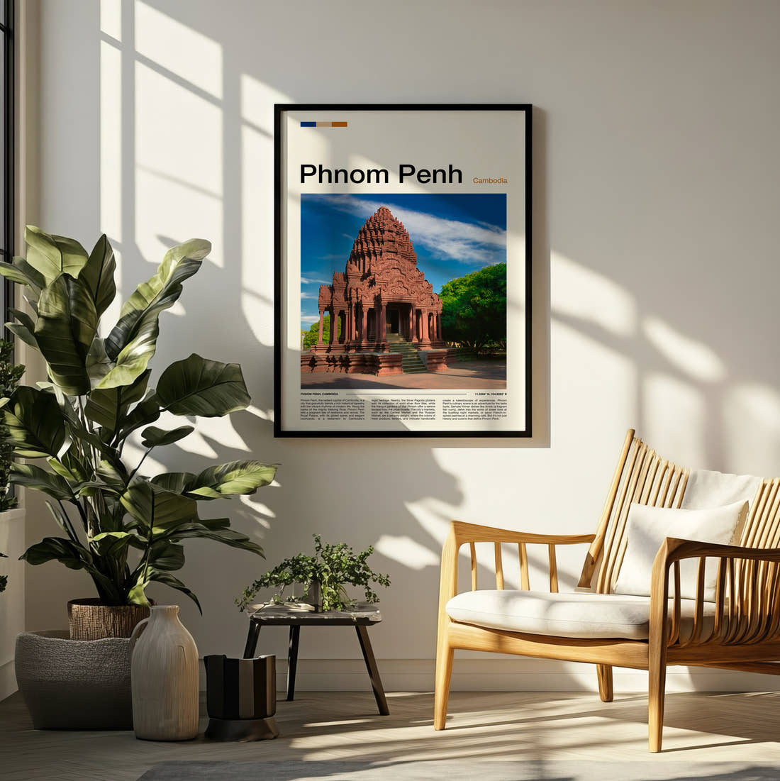 Phnom Penh Stone Temple Travel Print framed on a pale wall beside houseplants