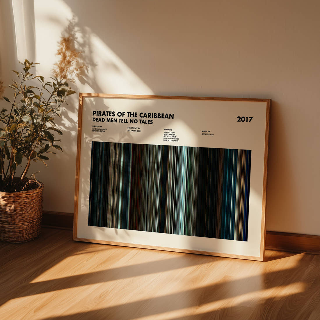 Pirates of the Caribbean: Dead Men Tell No Tales Movie Barcode Poster framed and leaning against a wall on a wooden floor
