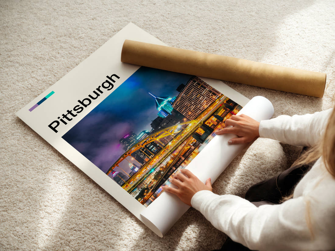 Pittsburgh Bridge At Night Travel Print being unrolled from its postal tube