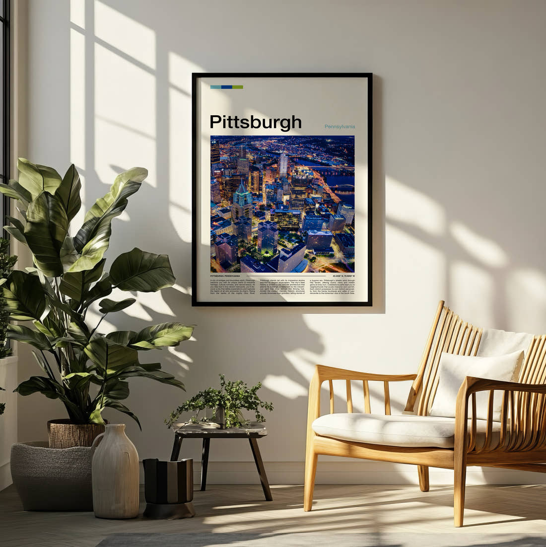 Pittsburgh Night Skyline From Above Travel Print framed on a pale wall beside houseplants