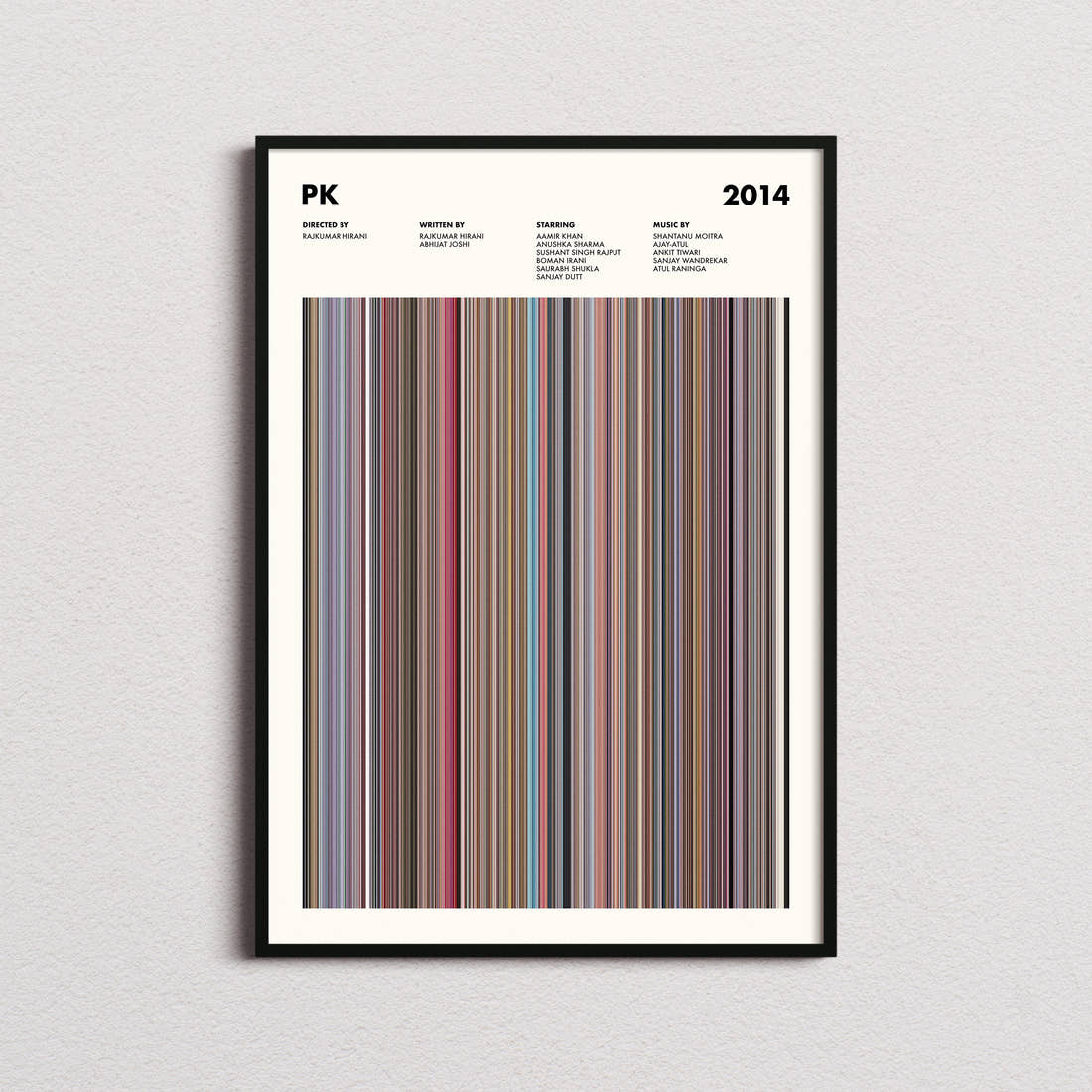PK Movie Barcode Poster framed on a plain studio wall