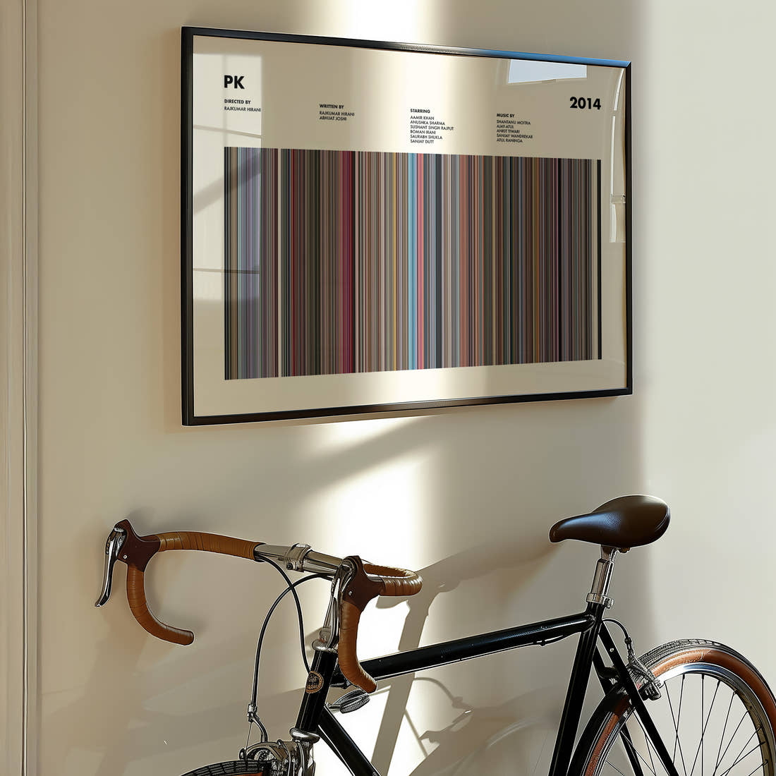 PK Movie Barcode Poster framed on the wall of a styled room setting