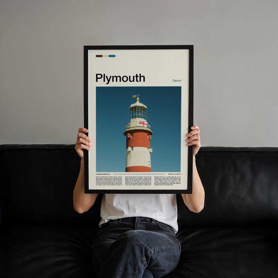 Plymouth Striped Lighthouse Tower Travel Print held up by hand to show the size of the print