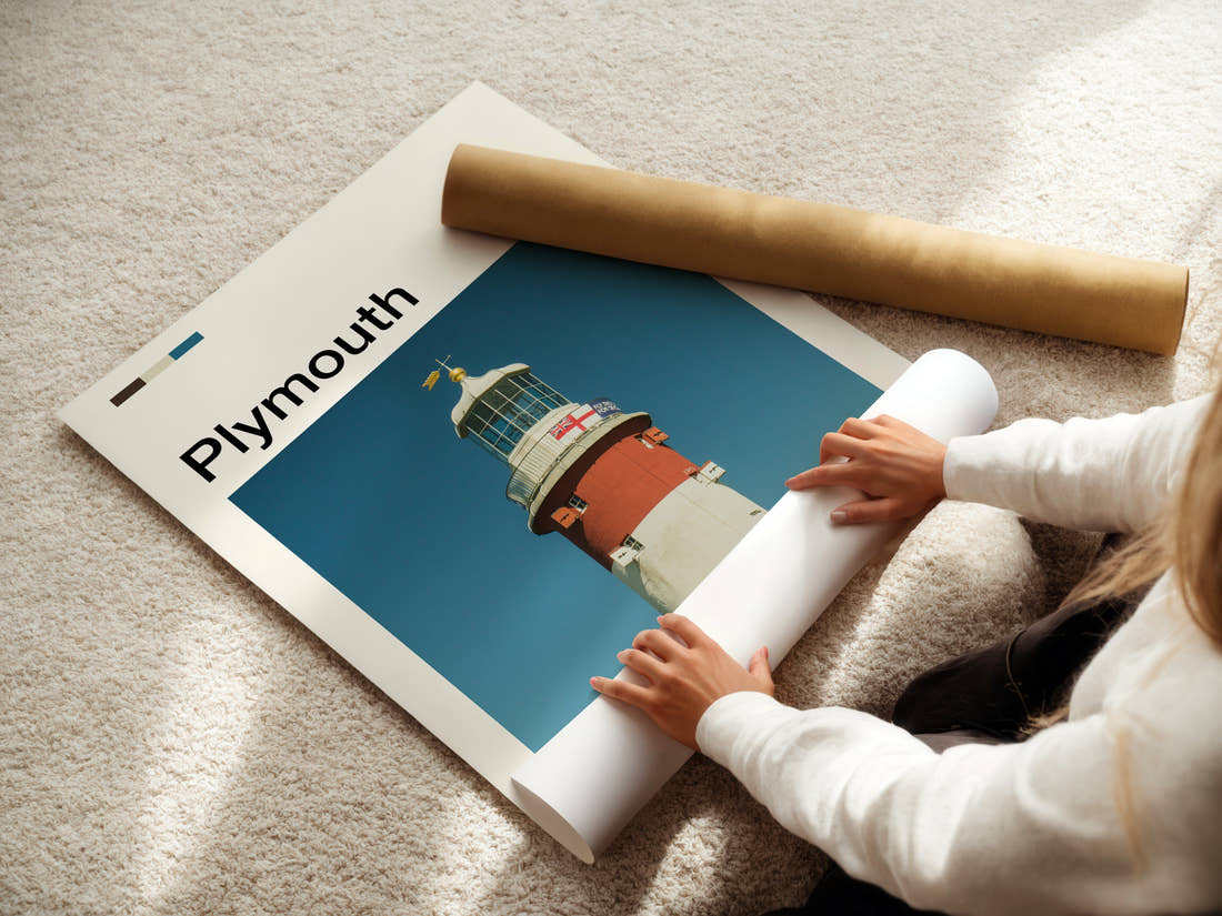 Plymouth Striped Lighthouse Tower Travel Print being unrolled from its postal tube
