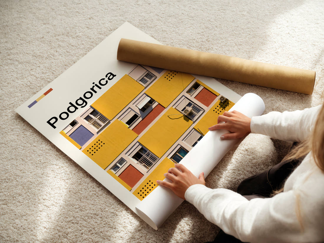 Podgorica Colourful Building Facade Travel Print being unrolled from its postal tube
