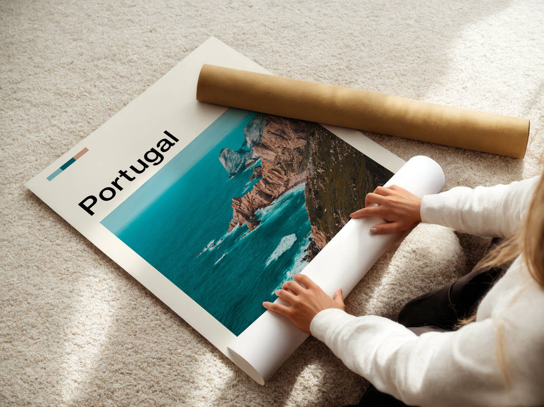 Portugal Coastal Cliffs Travel Print being unrolled from its postal tube