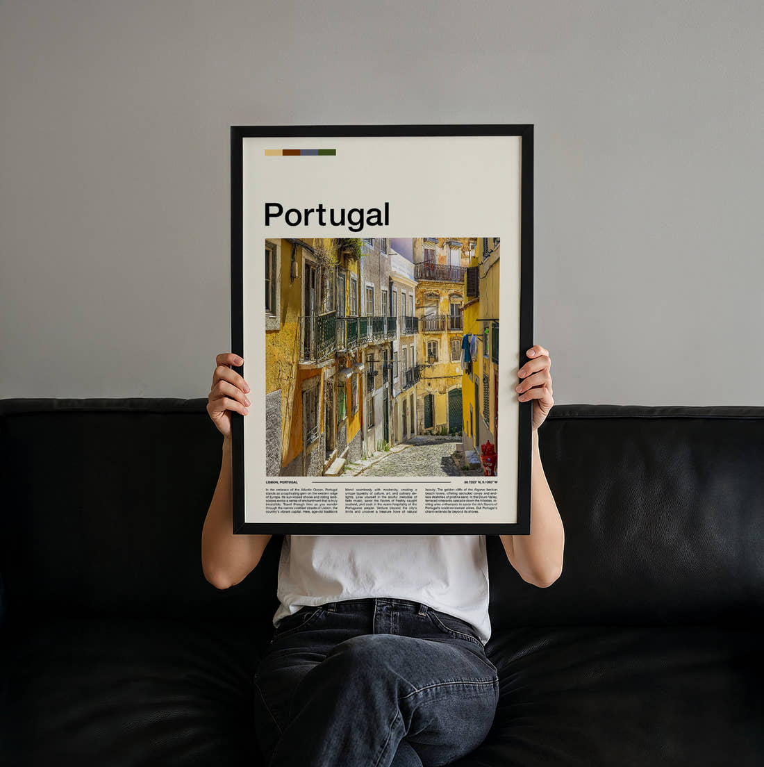 Portugal Narrow Street Travel Print held up by hand to show the size of the print