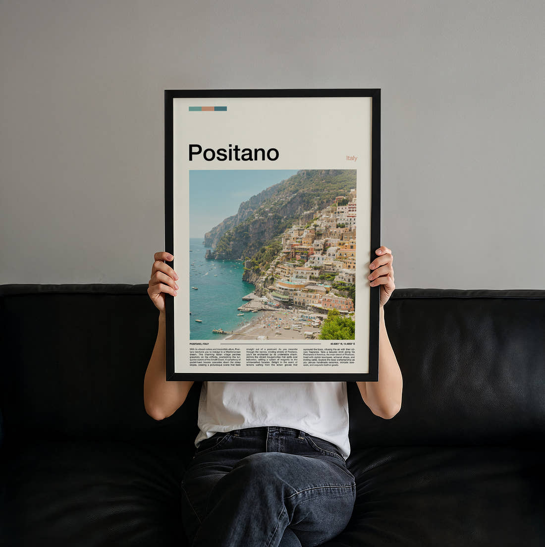 Positano Cliffside Town Travel Print held up by hand to show the size of the print