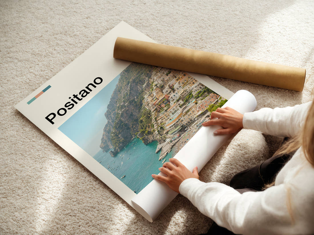 Positano Cliffside Town Travel Print being unrolled from its postal tube