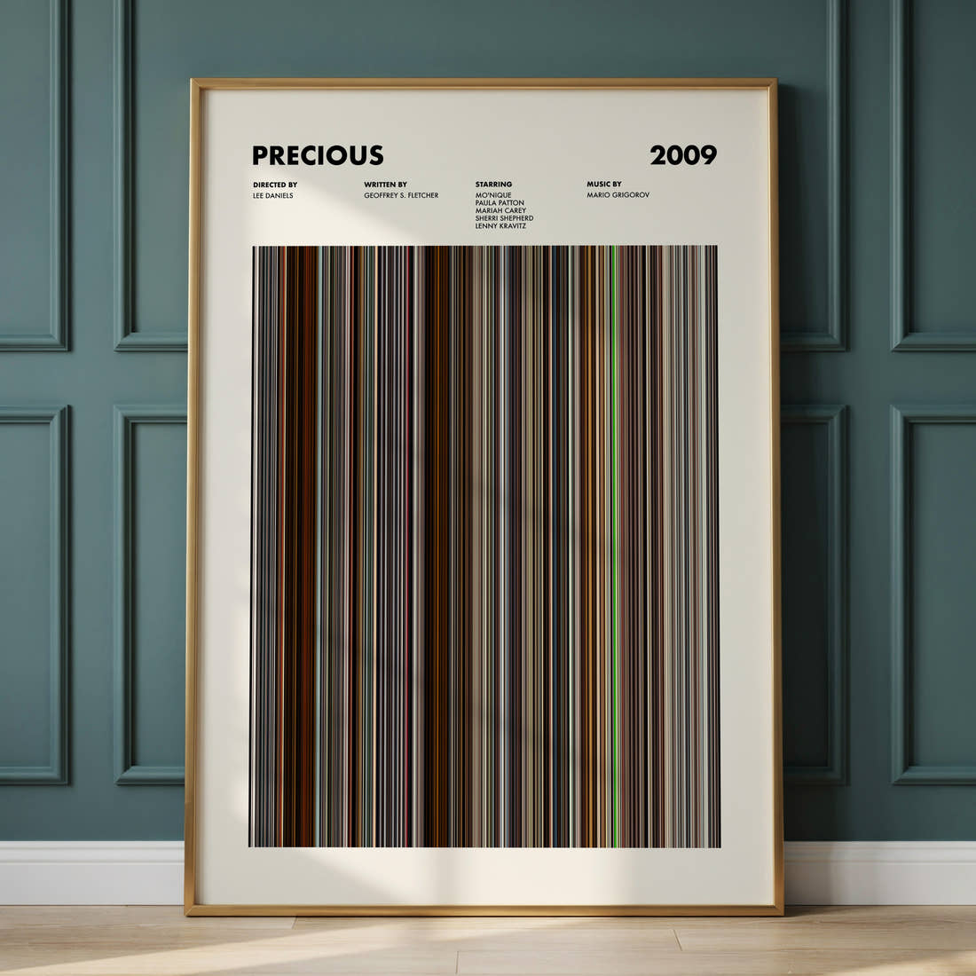 Precious Movie Barcode Poster framed and leaning against a panelled wall