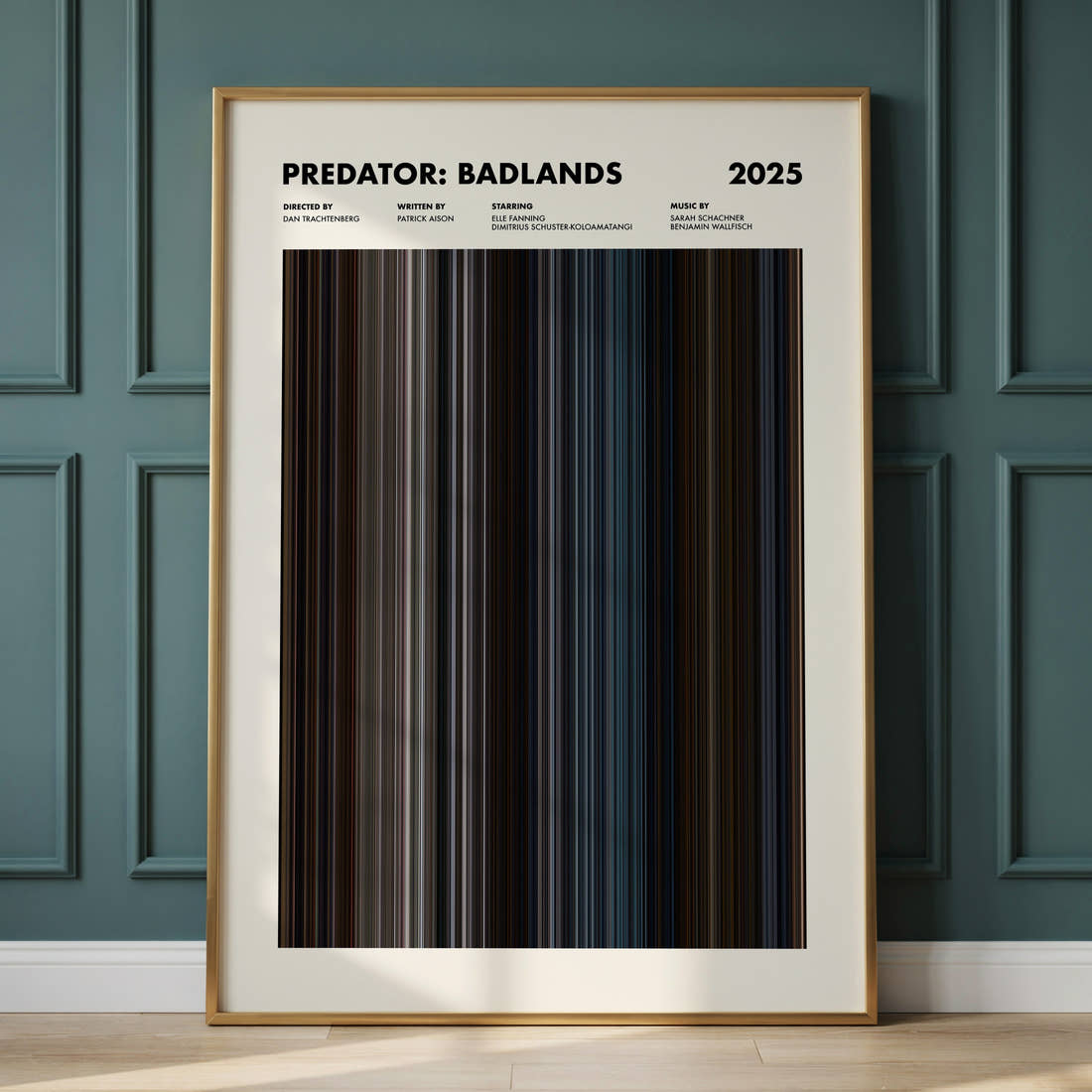 Predator: Badlands Movie Barcode Poster framed and leaning against a panelled wall