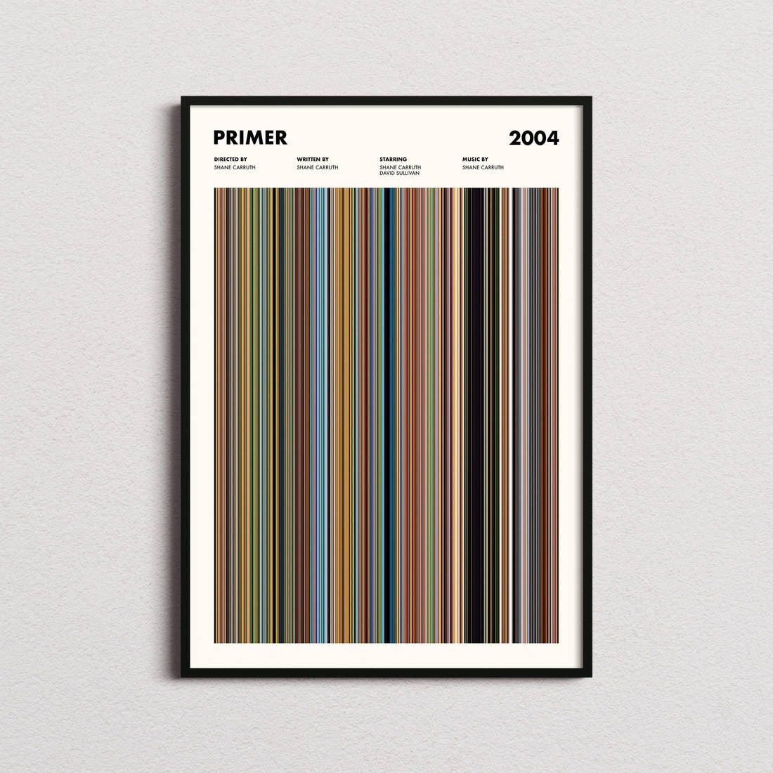 Primer Movie Barcode Poster framed on a plain studio wall