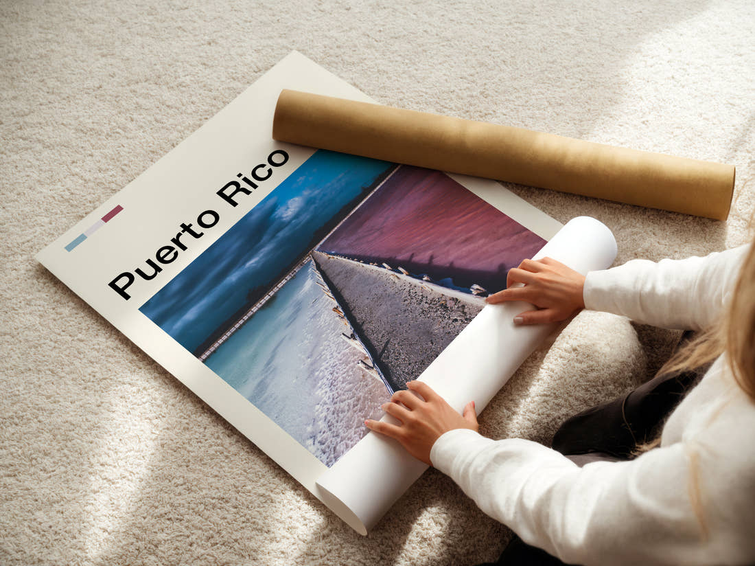 Puerto Rico Pink Water And Breakwater Travel Print being unrolled from its postal tube