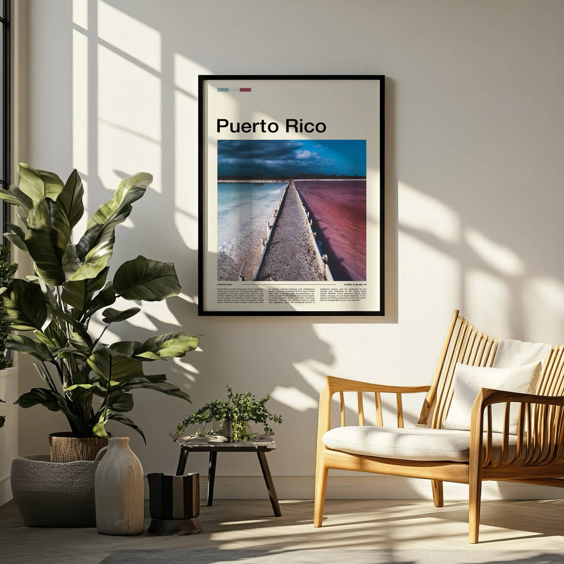 Puerto Rico Pink Water And Breakwater Travel Print framed on a pale wall beside houseplants