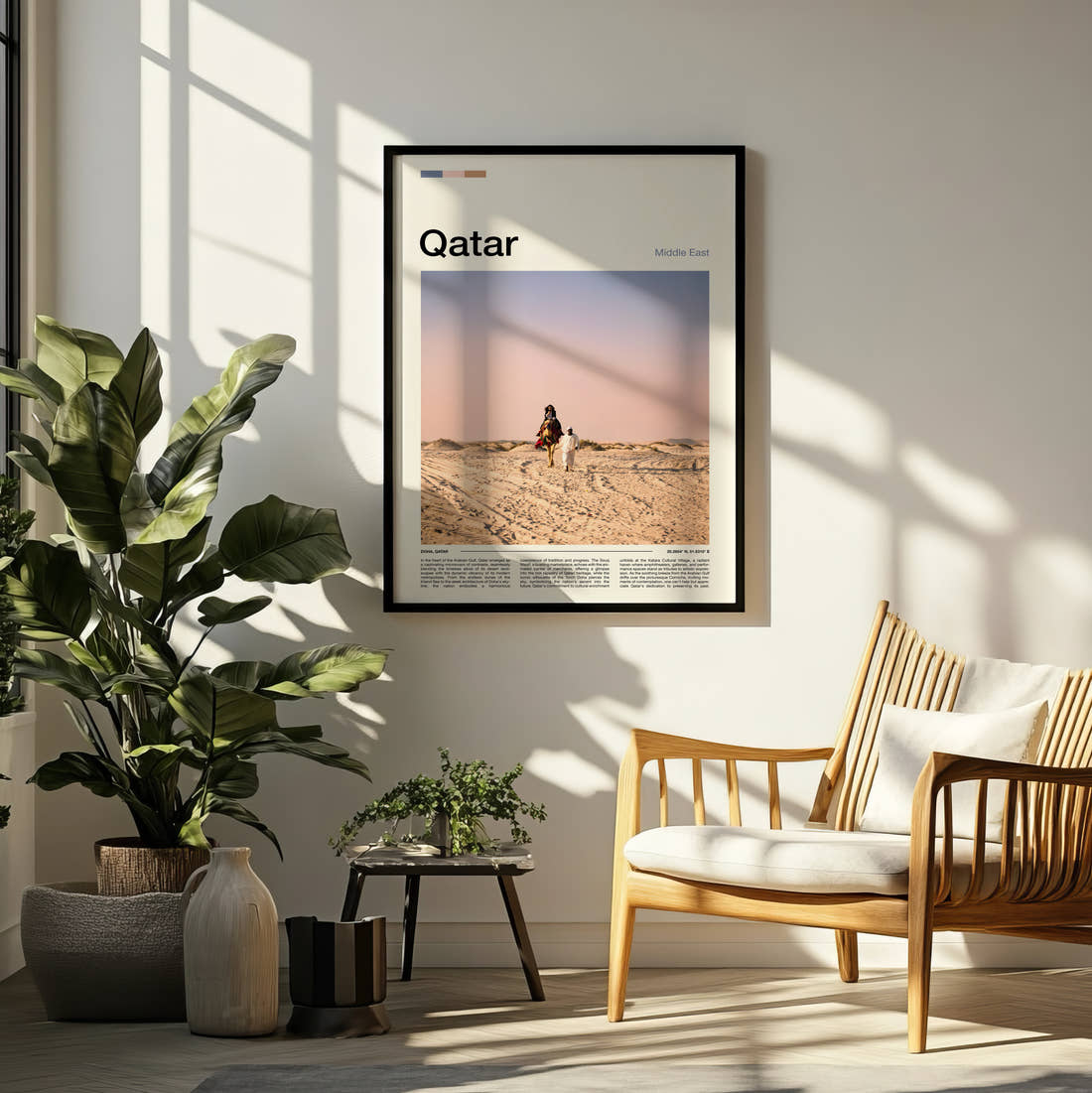 Qatar Camel Rider On Dunes Travel Print framed on a pale wall beside houseplants