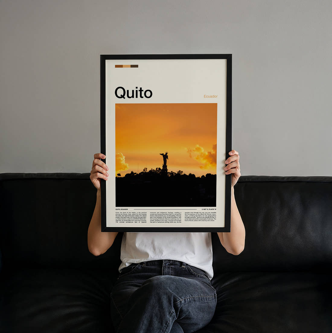 Quito Winged Virgin Statue Travel Print held up by hand to show the size of the print