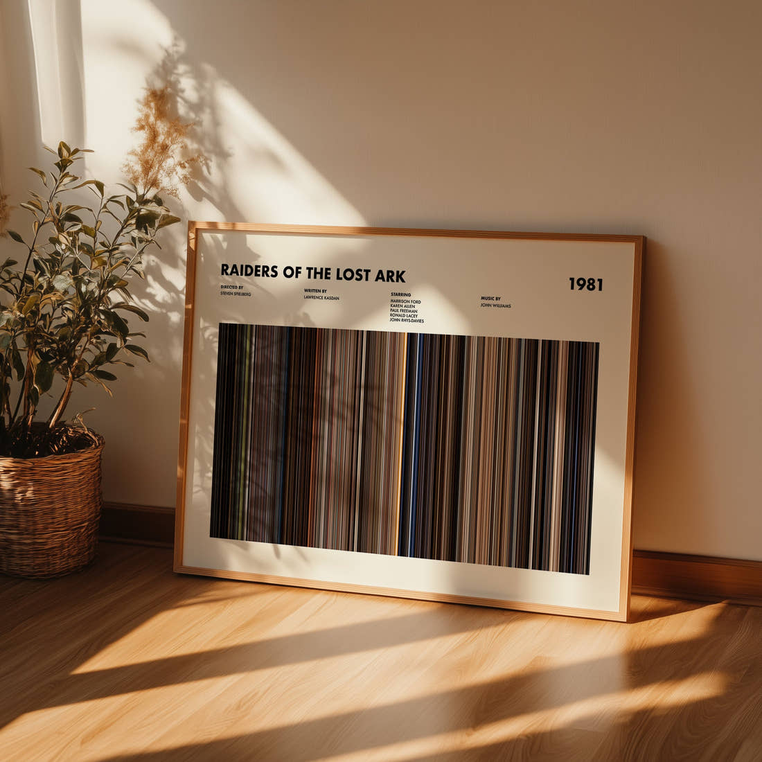 Raiders of the Lost Ark Movie Barcode Poster framed and leaning against a wall on a wooden floor