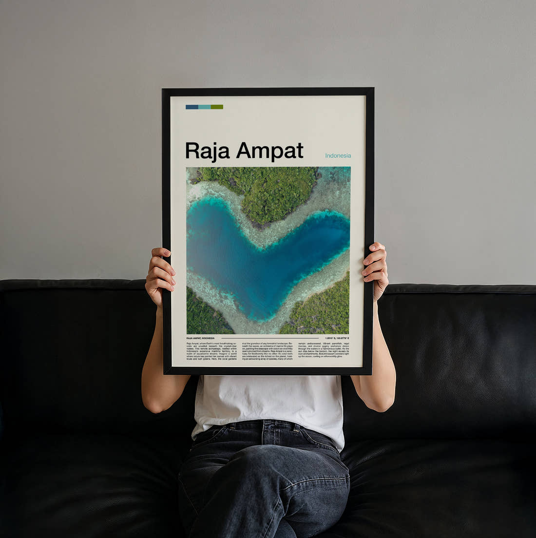 Raja Ampat Heart-Shaped Lagoon Travel Print held up by hand to show the size of the print
