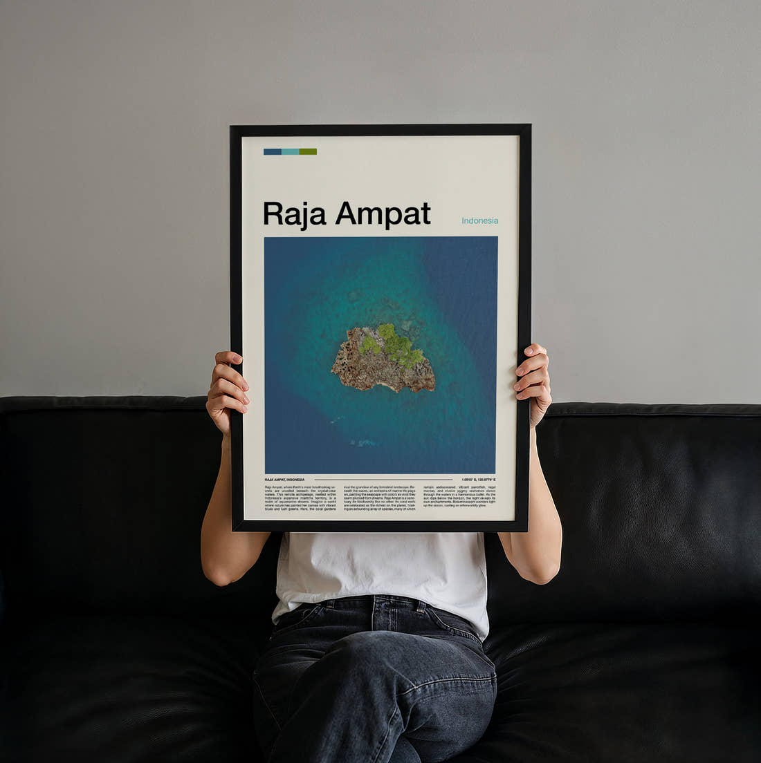 Raja Ampat Small Island From Above Travel Print held up by hand to show the size of the print