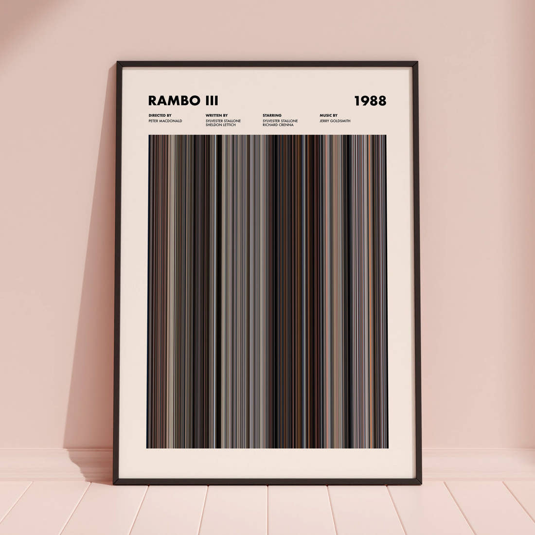 Rambo 3 Movie Barcode Poster framed and leaning against a coloured wall